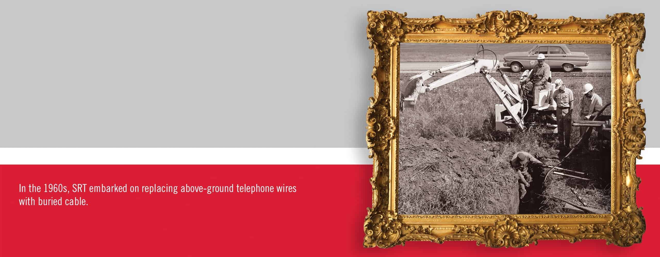 SRT employees demonstrate a telecommunications power panel used in the 1960s.